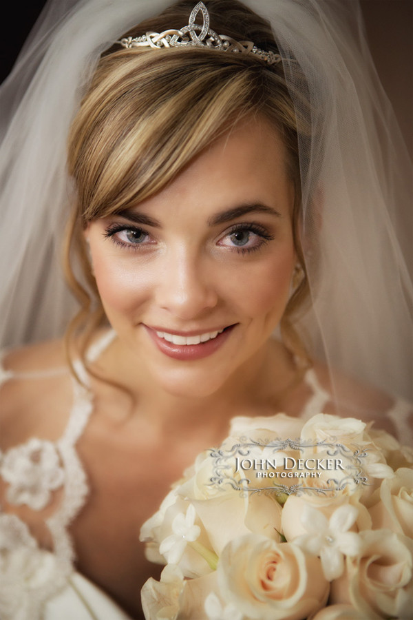 Bridget poses for a bridal portrait before her wedding at Lake Natoma Inn in Folsom, CA.